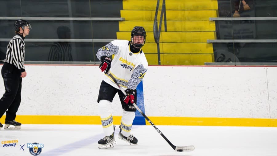 A Corners Hockey player carrying the puck through the neutral zone