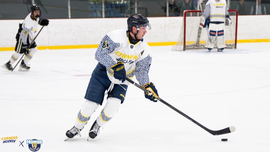 A Corners Hockey player cutting toward the net with the puck